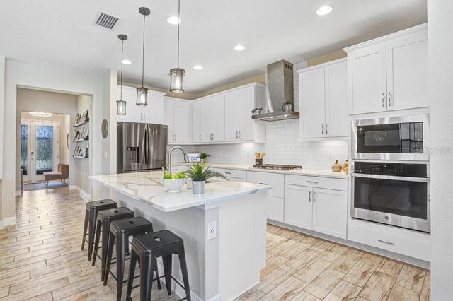 14828 PADDOCK POND AVENUE, Lithia, FL 33547