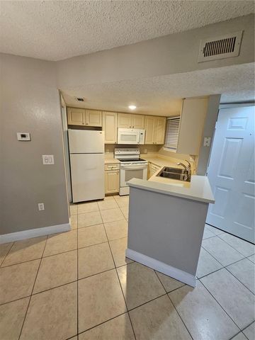 1908 LAKE ATRIUMS CIRCLE 15, Orlando, FL 32839