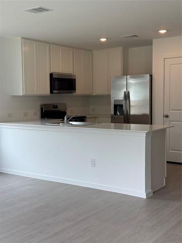 335 Parkin Court, Conroe, TX 77303