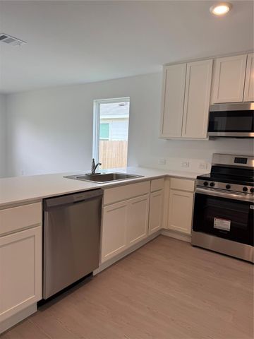 335 Parkin Court, Conroe, TX 77303