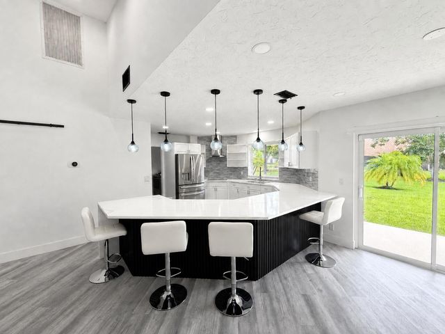 15545 Meadow Wood Drive, Wellington, FL 33414