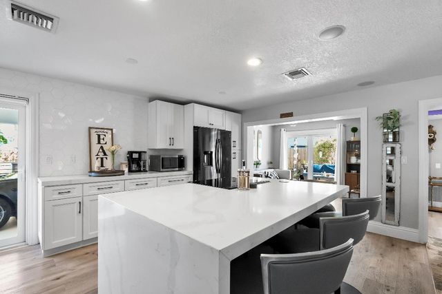 1605 Treemont Avenue, Jupiter, FL 33469