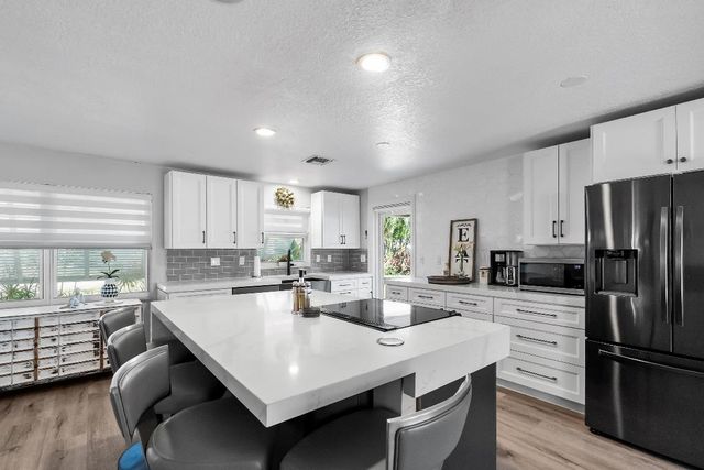 1605 Treemont Avenue, Jupiter, FL 33469