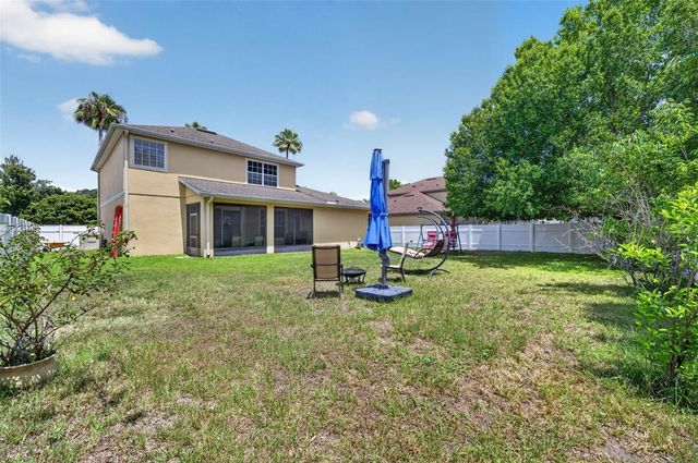 7438 CHELSEA HARBOUR DRIVE, Orlando, FL 32829