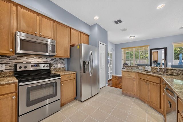 7438 CHELSEA HARBOUR DRIVE, Orlando, FL 32829