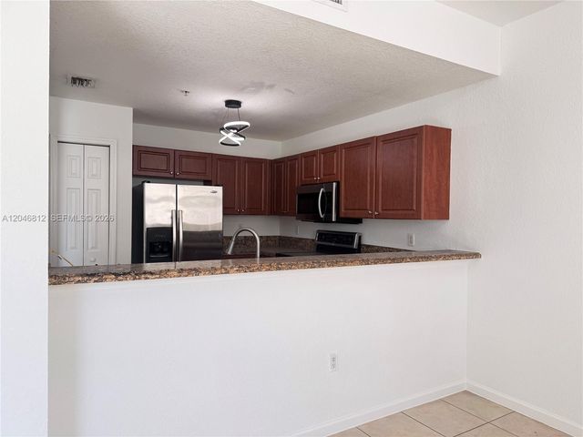 11102 NW 83rd Street 203, Doral, FL 33178