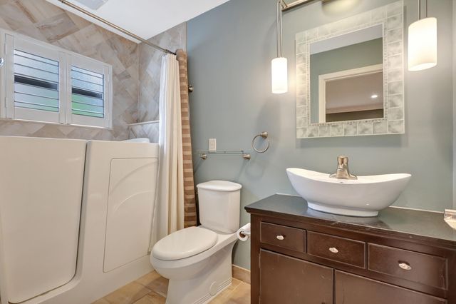 1003 Raintree Lane, Palm Beach Gardens, FL 33410