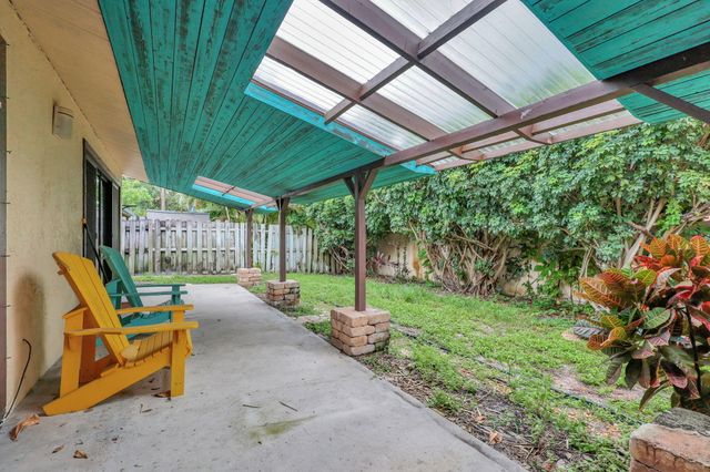 1003 Raintree Lane, Palm Beach Gardens, FL 33410