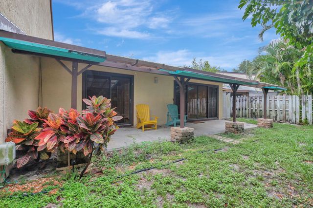 1003 Raintree Lane, Palm Beach Gardens, FL 33410