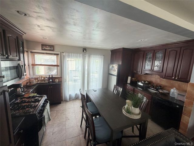 1556 Adams Street, Elmont, NY 11003
