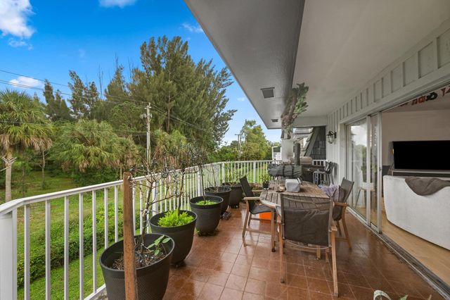 404 Pine Tree Court 6, Atlantis, FL 33462