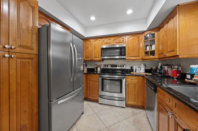 404 Pine Tree Court 6, Atlantis, FL 33462