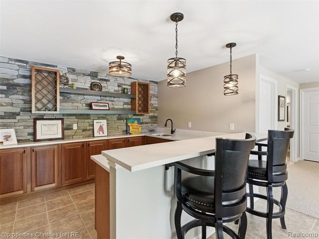 10822 Sparkling Waters Court, South Lyon, MI 48178
