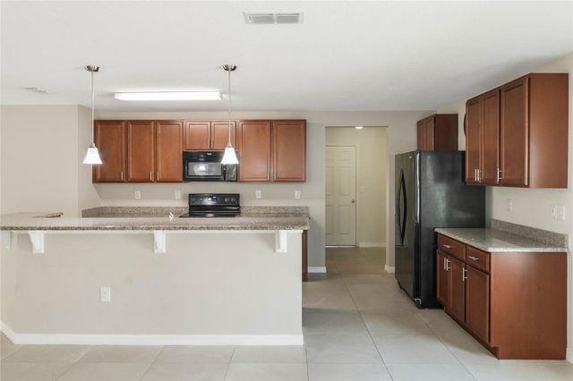 4602 HARVEST ROW LANE, St Cloud, FL 34772