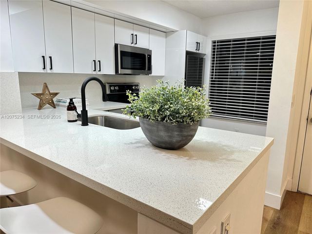 202 Lake Pointe Drive 104, Oakland Park, FL 33309