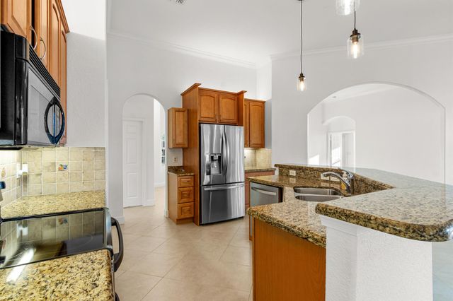 1297 SW Ingrassina Avenue, Port St Lucie, FL 34953