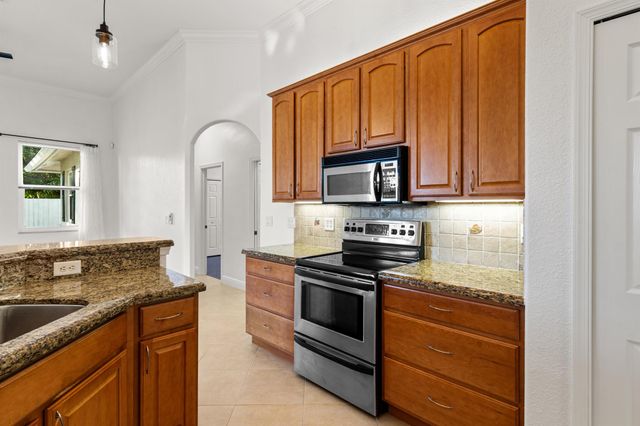1297 SW Ingrassina Avenue, Port St Lucie, FL 34953