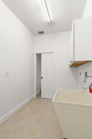 1297 SW Ingrassina Avenue, Port St Lucie, FL 34953