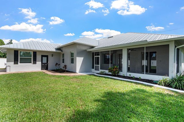 1297 SW Ingrassina Avenue, Port St Lucie, FL 34953