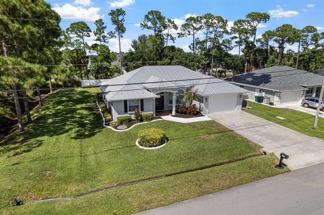 1297 SW Ingrassina Avenue, Port St Lucie, FL 34953