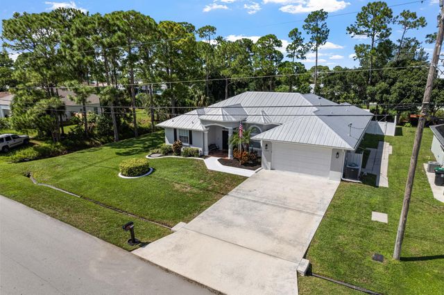 1297 SW Ingrassina Avenue, Port St Lucie, FL 34953