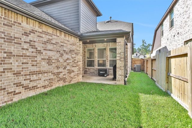 440 Flowering Lotus Court, Conroe, TX 77318