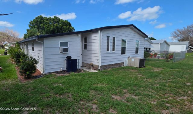 579 N Dolphin Circle, Barefoot Bay, FL 32976