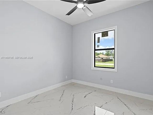 702 RICHMOND AVE N, Lehigh Acres, FL 33972