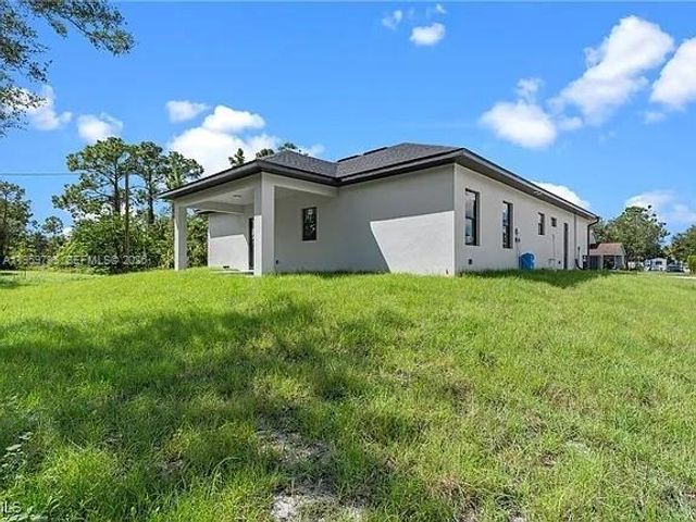 702 RICHMOND AVE N, Lehigh Acres, FL 33972