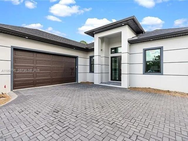 702 RICHMOND AVE N, Lehigh Acres, FL 33972