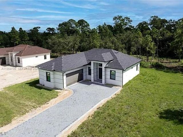 702 RICHMOND AVE N, Lehigh Acres, FL 33972