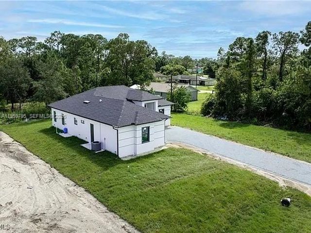 702 RICHMOND AVE N, Lehigh Acres, FL 33972