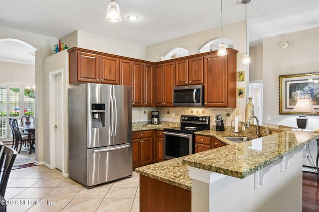 1716 SECLUDED WOODS Way, Fleming Island, FL 32003