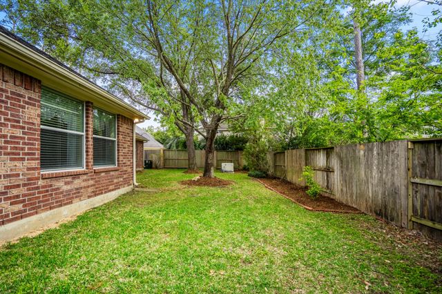 9711 Ashdown Forest Drive, Spring, TX 77379