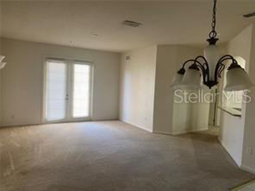 Image 2 of property listing at 3301 WHITESTONE CIRCLE 205, Kissimmee, FL 34741