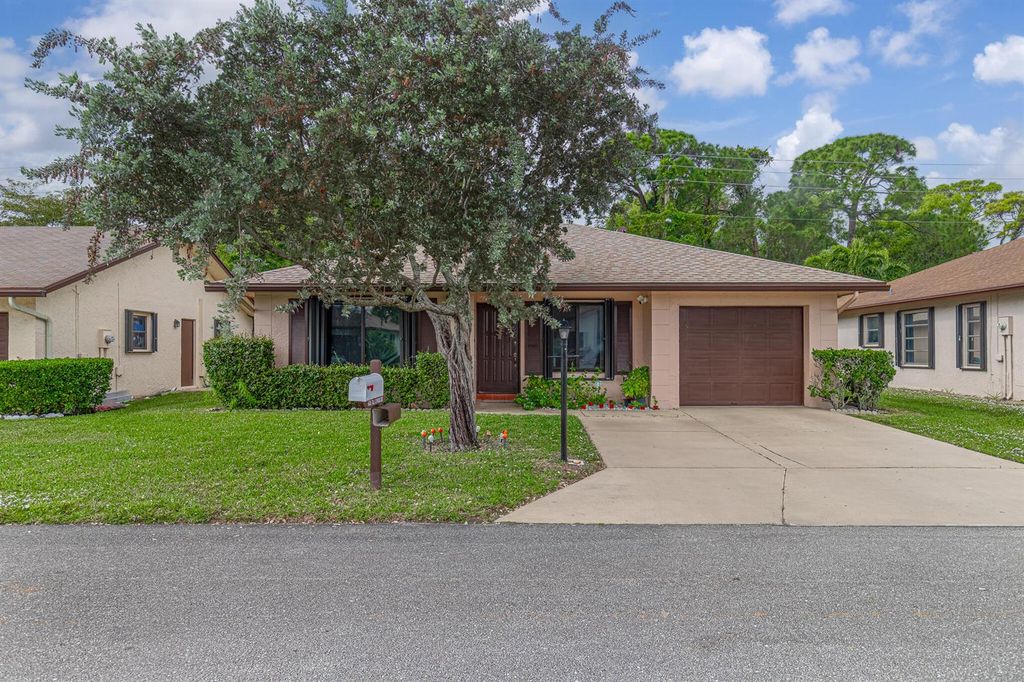 6335 Tall Cypress Circle, Greenacres, FL 33463