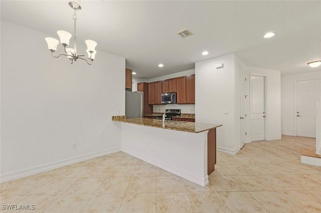 7770 BRISTOL CIR, Naples, FL 34120