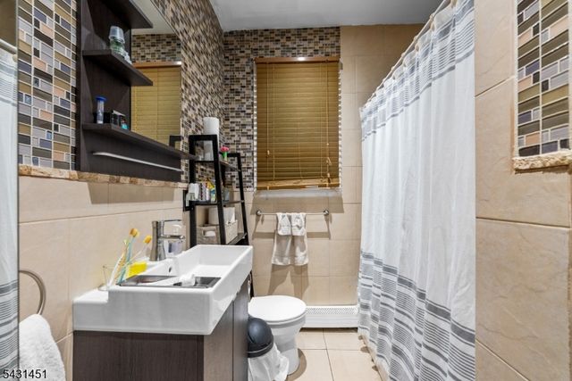171 Burgess Pl, Passaic City, NJ 07055