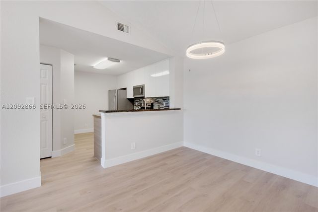 10125 W Sunrise Blvd 302, Plantation, FL 33322