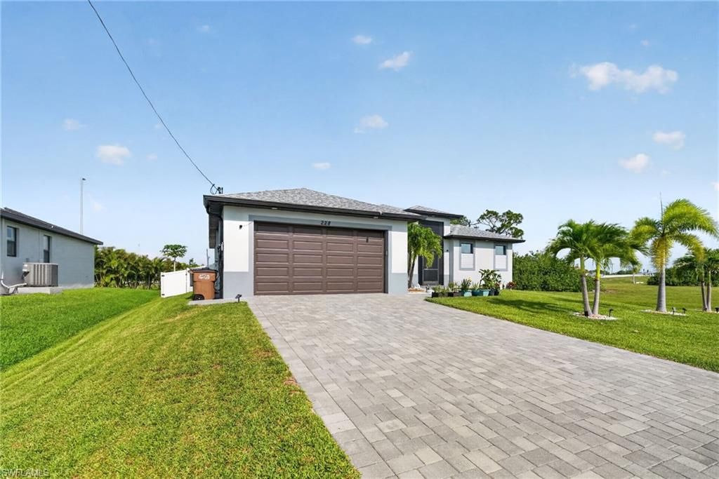 228 SW 31st PL, CAPE CORAL, FL 33991 — photo 2