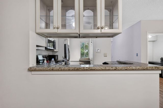 14881 WEDGEFIELD Drive 103, Delray Beach, FL 33446