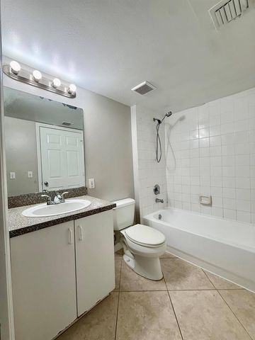 5065 Wiles Road 105, Coconut Creek, FL 33073