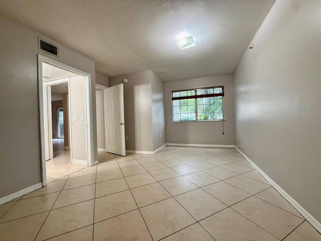 5065 Wiles Road 105, Coconut Creek, FL 33073
