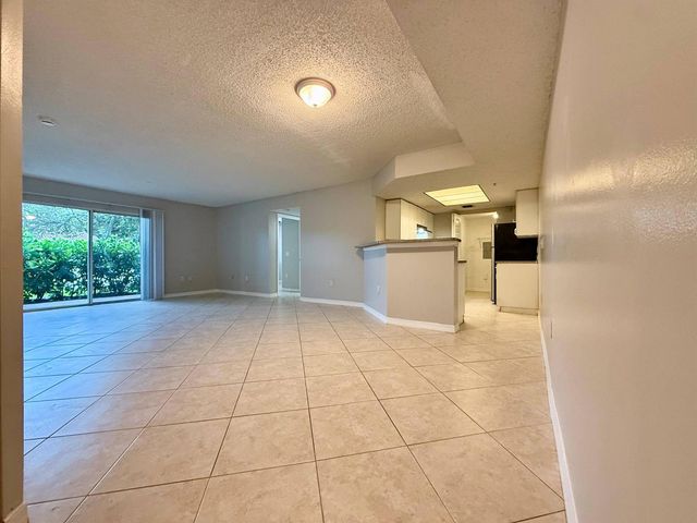 5065 Wiles Road 105, Coconut Creek, FL 33073