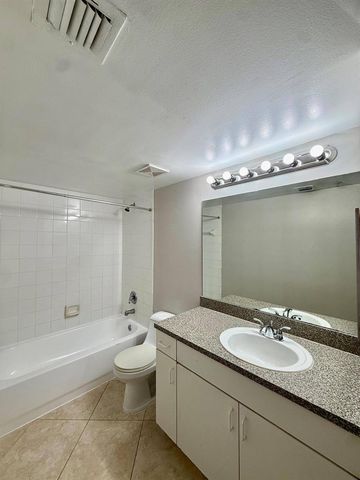 5065 Wiles Road 105, Coconut Creek, FL 33073