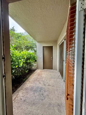 5065 Wiles Road 105, Coconut Creek, FL 33073