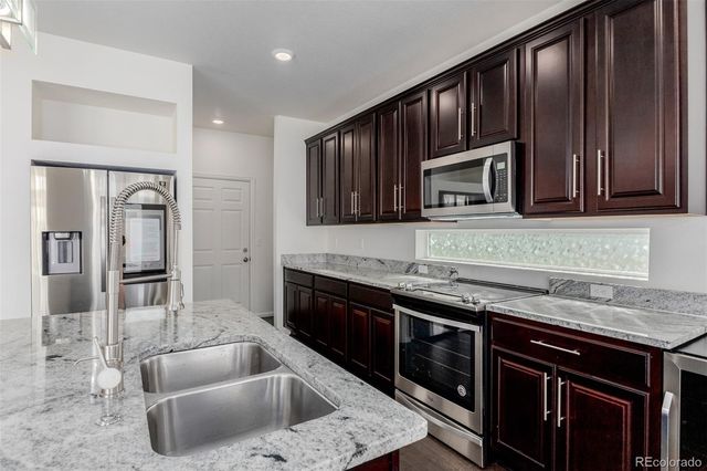 4577 N Quatar Court, Aurora, CO 80019