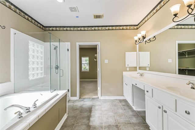 15 Filigree Pines Place, The Woodlands, TX 77382