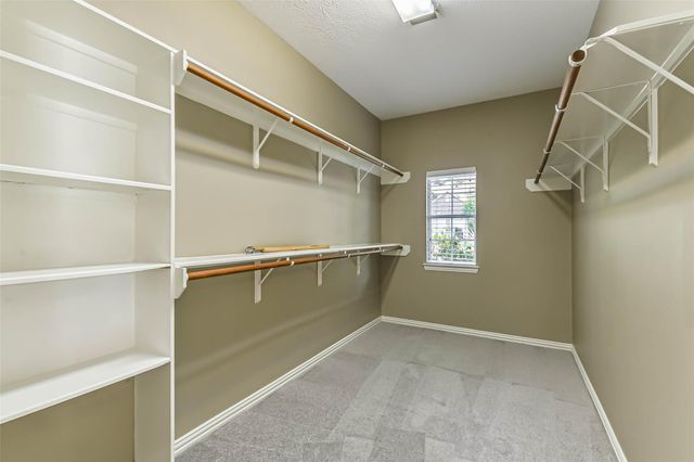 15 Filigree Pines Place, The Woodlands, TX 77382