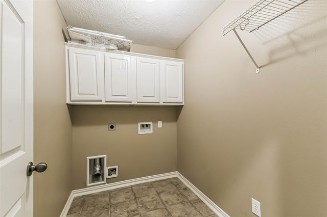 15 Filigree Pines Place, The Woodlands, TX 77382